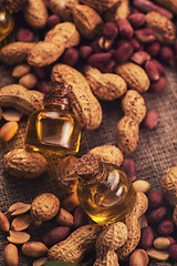 Image showing Natural peanut with oil in a glass