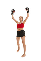 Image showing Fit beautiful woman with the boxing gloves isolated on white background