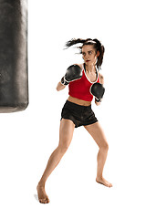 Image showing Fit beautiful woman with the boxing gloves isolated on white background