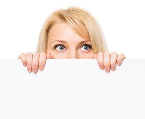 Image showing Woman with blank signboard