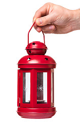 Image showing Hand holding red lantern