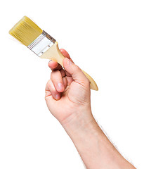 Image showing Hand with paint brush