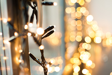 Image showing close up of christmas garland on window