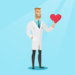 Image showing Doctor cardiologist holding heart.