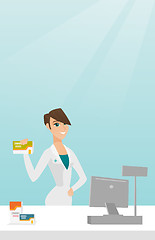 Image showing Pharmacist showing some medicine.