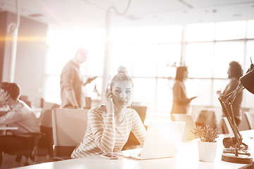 Image showing Young businesswoman using computer at work