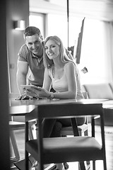 Image showing couple using tablet at home