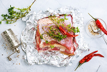 Image showing raw meat in foil