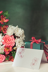 Image showing Love background with pink roses, flowers, gift on table