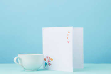 Image showing Love background with card and cup gift on table