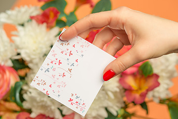 Image showing Love background with pink roses, flowers, gift on table