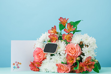 Image showing Love background with pink roses, flowers, gift on table