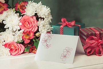 Image showing Love background with pink roses, flowers, gift on table