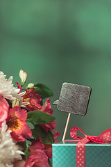 Image showing Love background with pink roses, flowers, gift on table