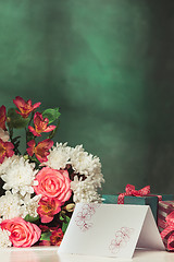 Image showing Love background with pink roses, flowers, gift on table