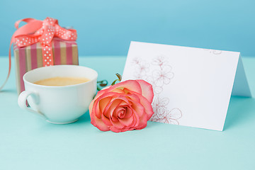 Image showing Love background with pink roses, flowers, gift on table
