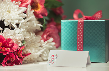 Image showing Love background with pink roses, flowers, gift on table