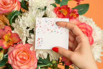 Image showing Love background with pink roses, flowers, gift on table