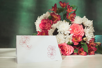 Image showing Love background with pink roses, flowers, gift on table