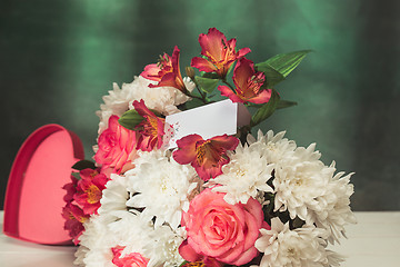 Image showing Love background with pink roses, flowers, gift on table