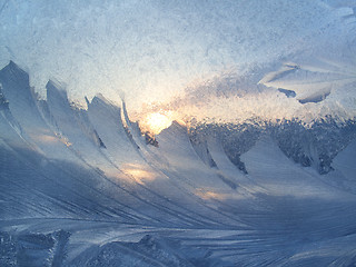 Image showing Beautiful ice pattern and sunlight on winter glass