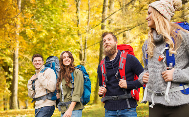 Image showing hiking friends or travelers with backpacks