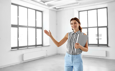 Image showing businesswoman or realtor with folder at office