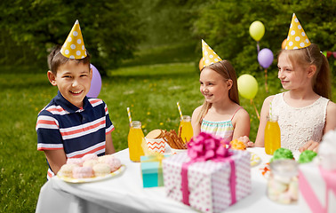 Image showing happy kids on birthday party at summer garden