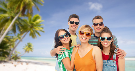 Image showing friends in sunglasses over white background