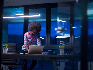 Image showing black businesswoman using a laptop in startup office