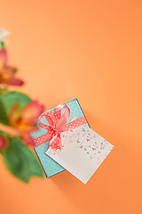 Image showing Love background with pink roses, flowers, gift on table