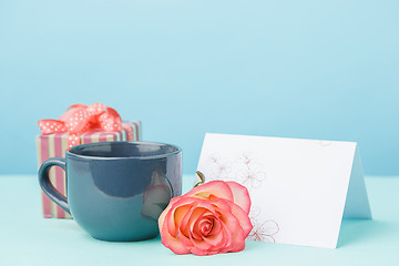 Image showing Love background with pink roses, flowers, gift on table