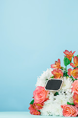 Image showing Love background with pink roses, flowers, gift on table