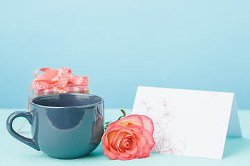 Image showing Love background with pink roses, flowers, gift on table