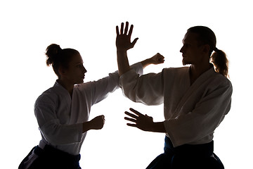 Image showing Man and woman fighting at Aikido training in martial arts school