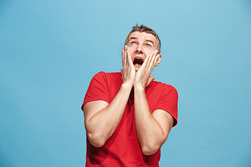 Image showing Handsome man in stress isolated on blue