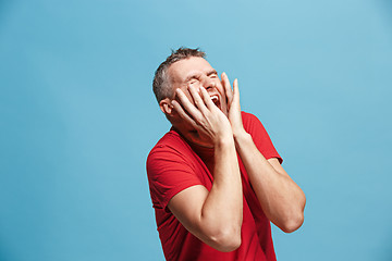 Image showing Handsome man in stress isolated on blue