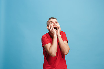 Image showing Handsome man in stress isolated on blue