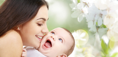 Image showing mother with baby over cherry blossom background