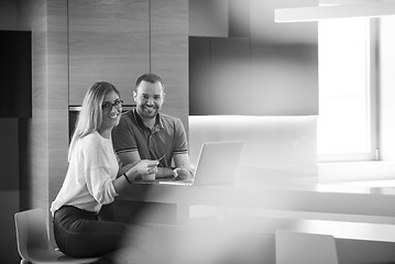 Image showing happy young couple buying online