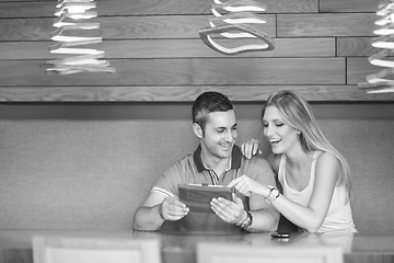 Image showing couple using tablet at home