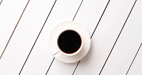 Image showing Cup of hot beverage on table