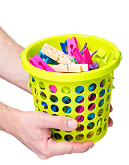 Image showing Hand hold bucket with clothespin