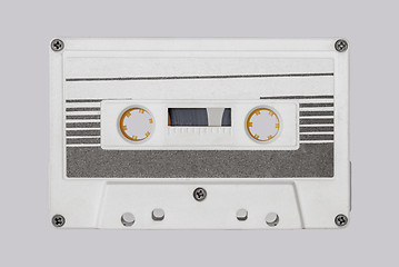 Image showing Retro white audio cassette tape isolated on white background.