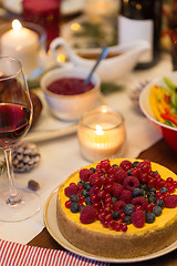 Image showing close up of cake and other food on christmas table