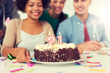 Image showing team greeting coworker at office birthday party