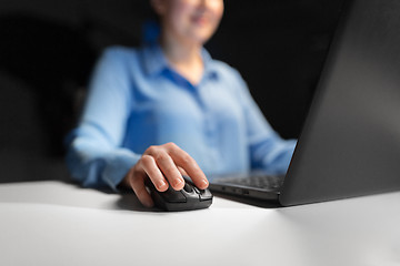 Image showing close up of businesswoman using computer mouse