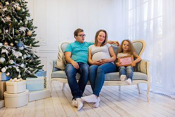 Image showing Family portrait near christmas tree