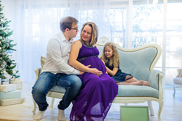 Image showing Family portrait near christmas tree