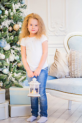 Image showing Cute girl and Christmas Tree